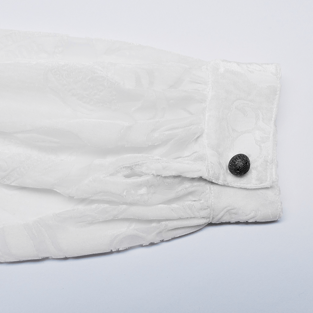 Close-up of the Victorian Gothic shirt sleeve featuring intricate flocked velvet and a stylish button detail.