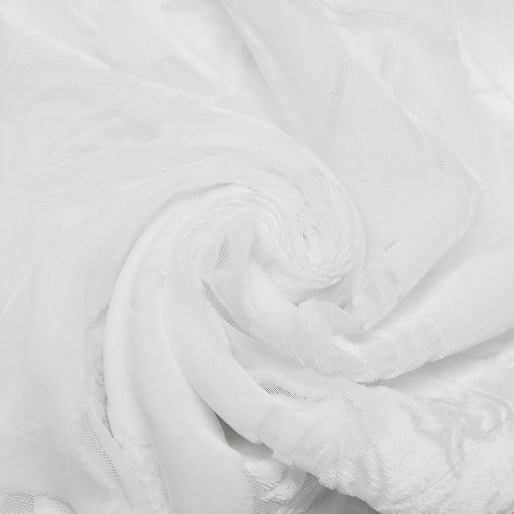 Close-up of soft, white, plush velvet fabric showcasing intricate texture and luxurious feel.