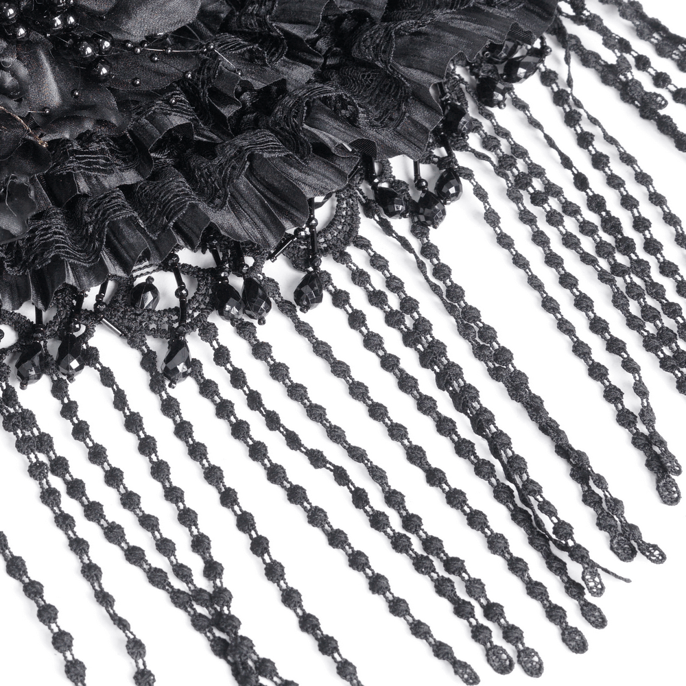 Close-up of a Victorian Gothic hat featuring elegant black lace, beaded fringe, and delicate feather details.