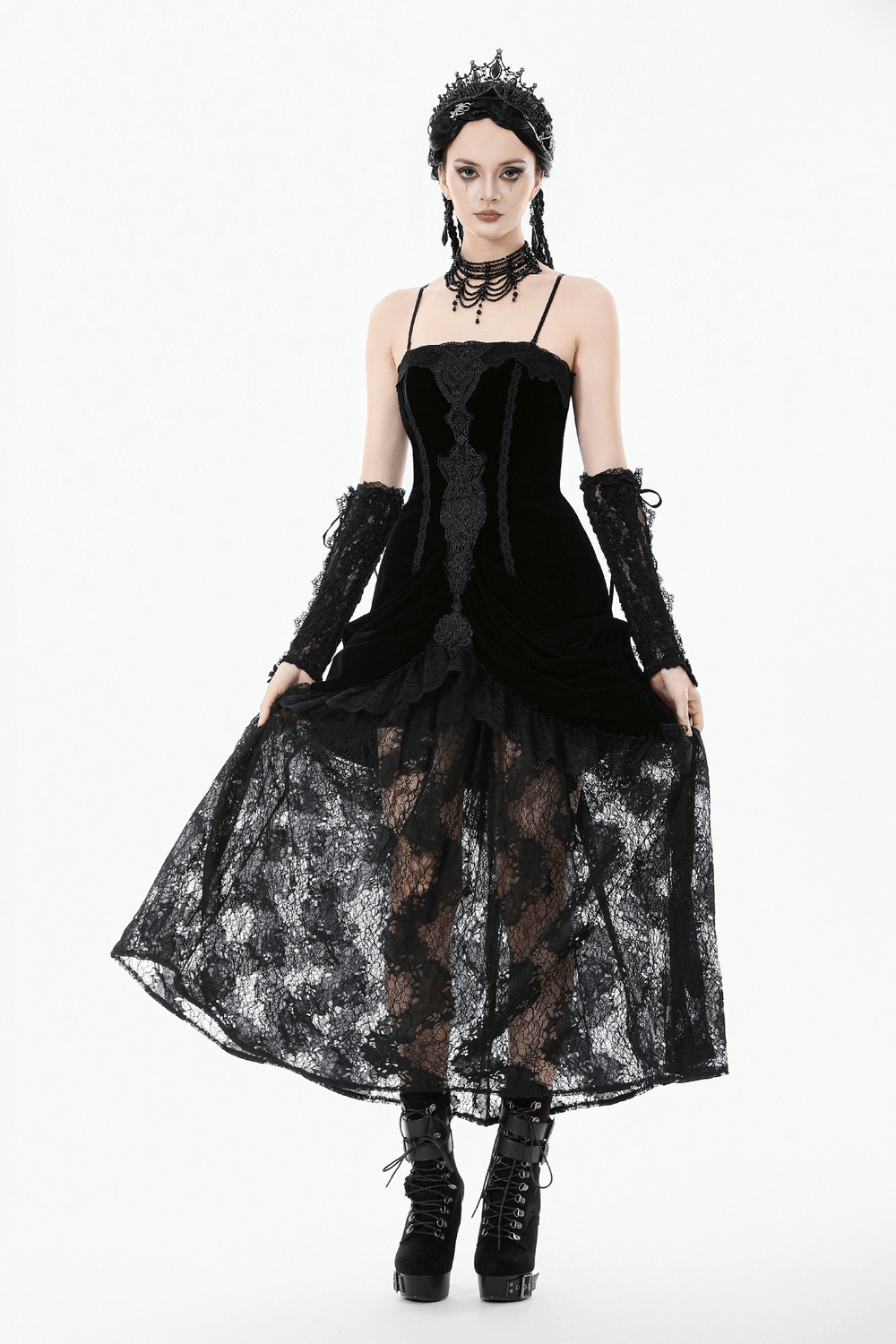 Victorian Gothic Lace and Velvet Layered Evening Dress showcased by a model in striking black lace and velvet attire.