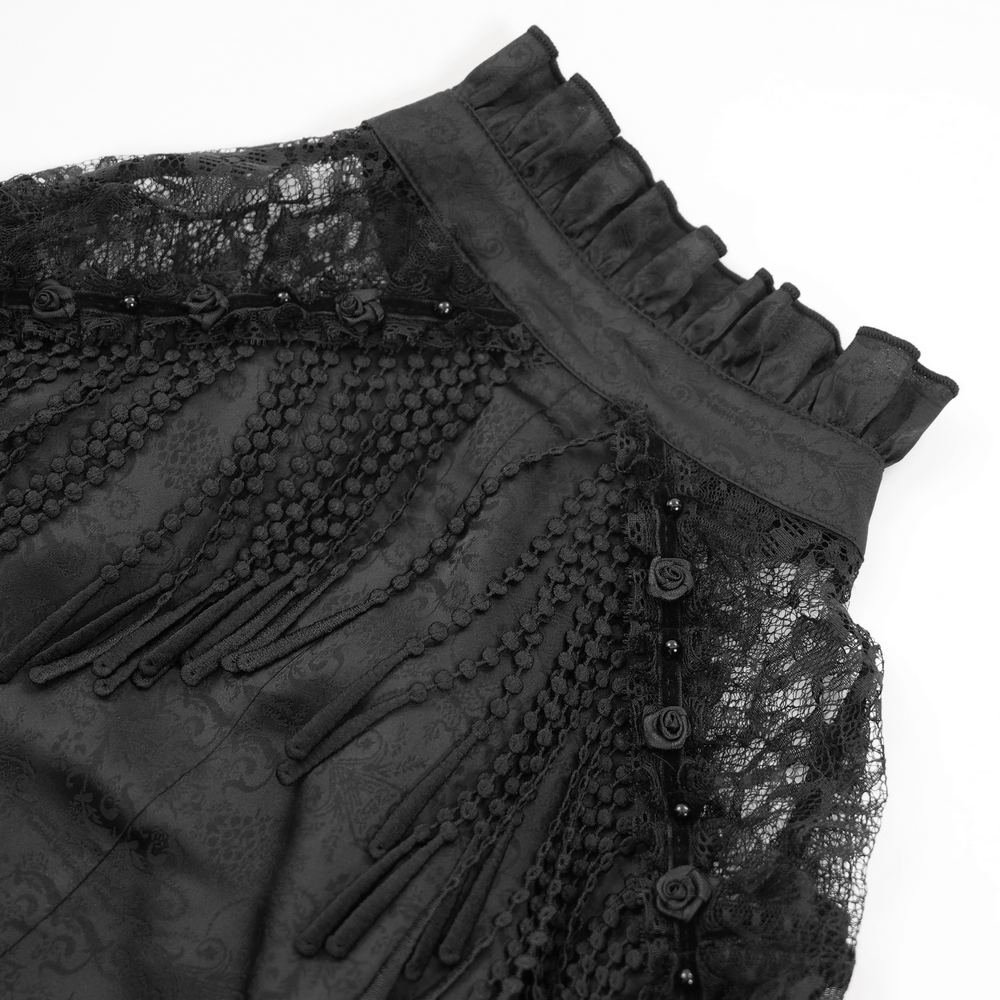 Elegant Victorian gothic lace blouse with beaded tassels and ruffled neckline detail in classic black.