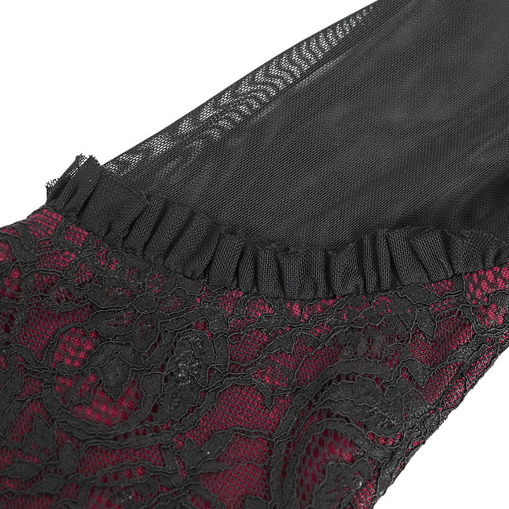 Close-up of Victorian gothic lace blouse with sheer black mesh and ruffled crimson cuffs showcasing intricate floral lace details.