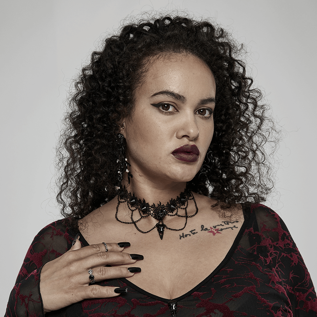 Victorian Gothic lace choker with bird skull pendant worn by a model, highlighting elegant gothic style.