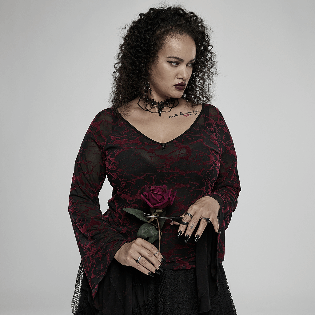 Model showcasing a Victorian Gothic lace choker with bird skull pendant, holding a rose, in dark attire.