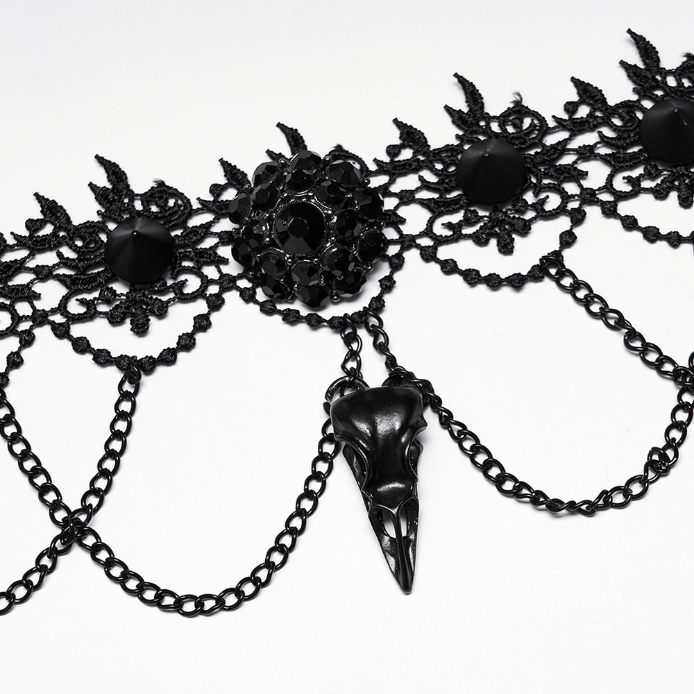 Victorian Gothic lace choker with black bird skull pendant and chain detail, perfect for a mysterious goth look.