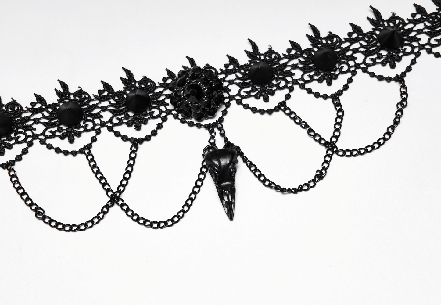 Victorian Gothic lace choker with a bird skull pendant and chain detailing, perfect for a dark, elegant look.