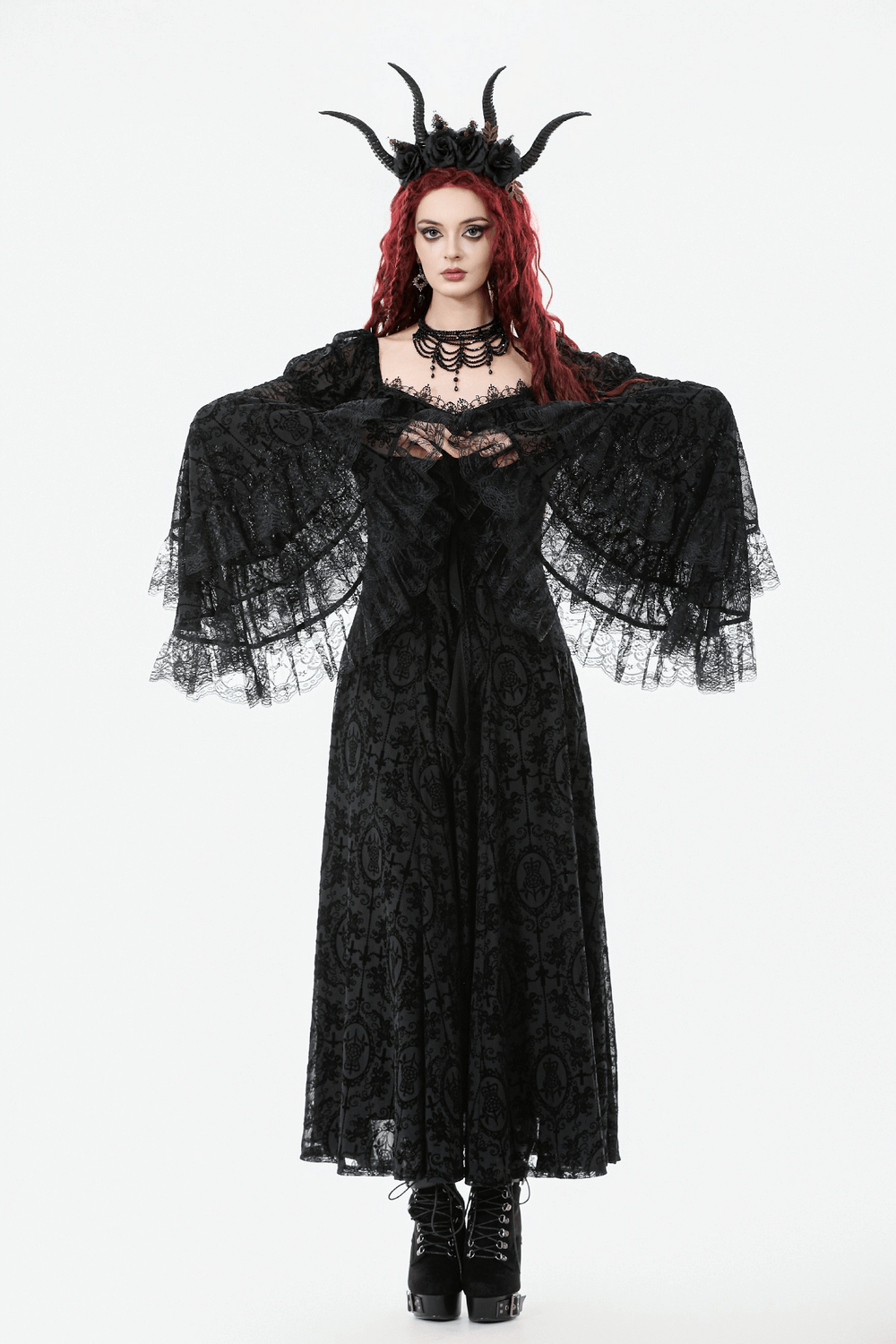 Victorian Gothic Lace Maxi Dress with Bell Sleeves worn by model with red hair and dramatic accessories.