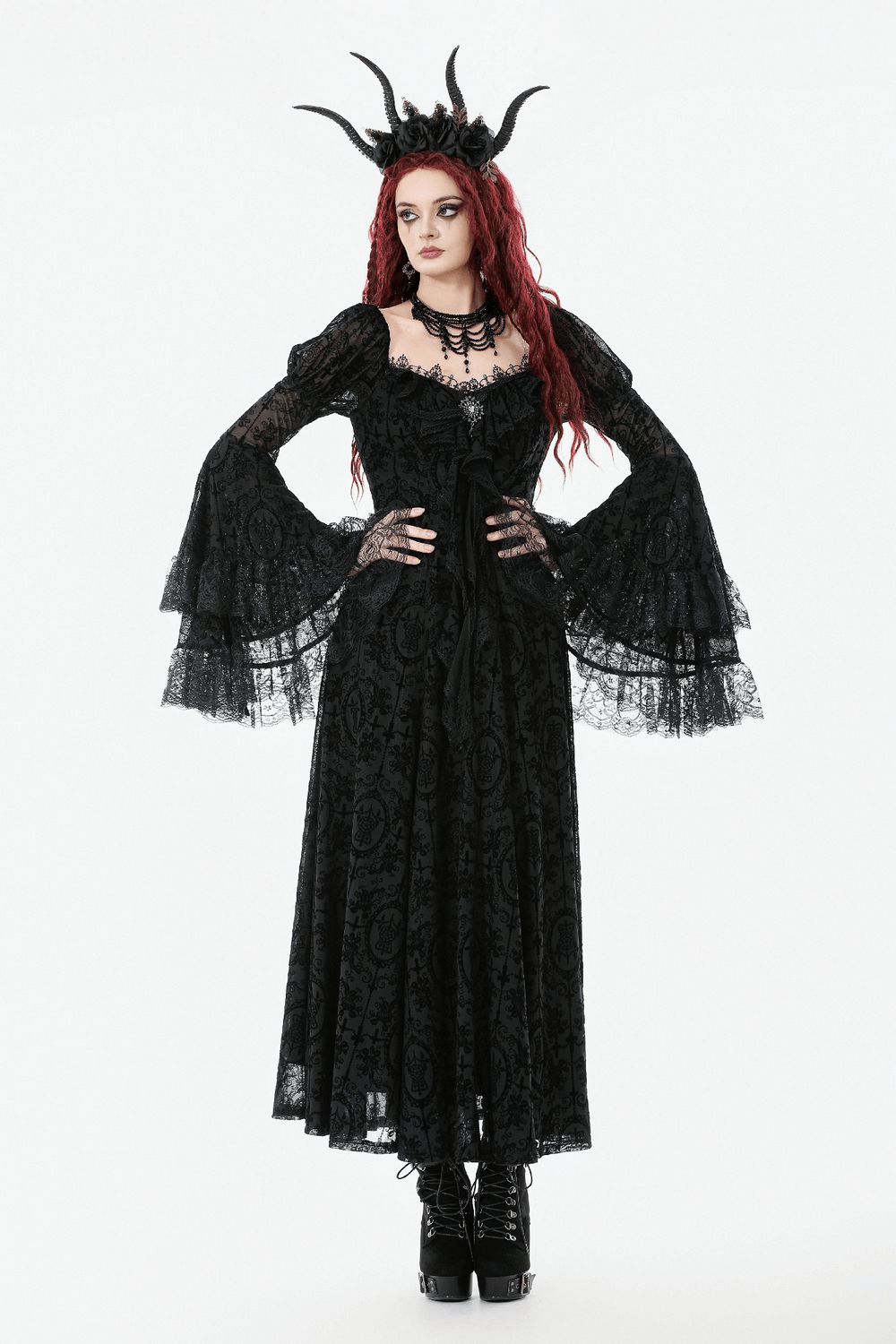 Victorian Gothic Lace Maxi Dress with Bell Sleeves styled with accessories and a dramatic horned headpiece.