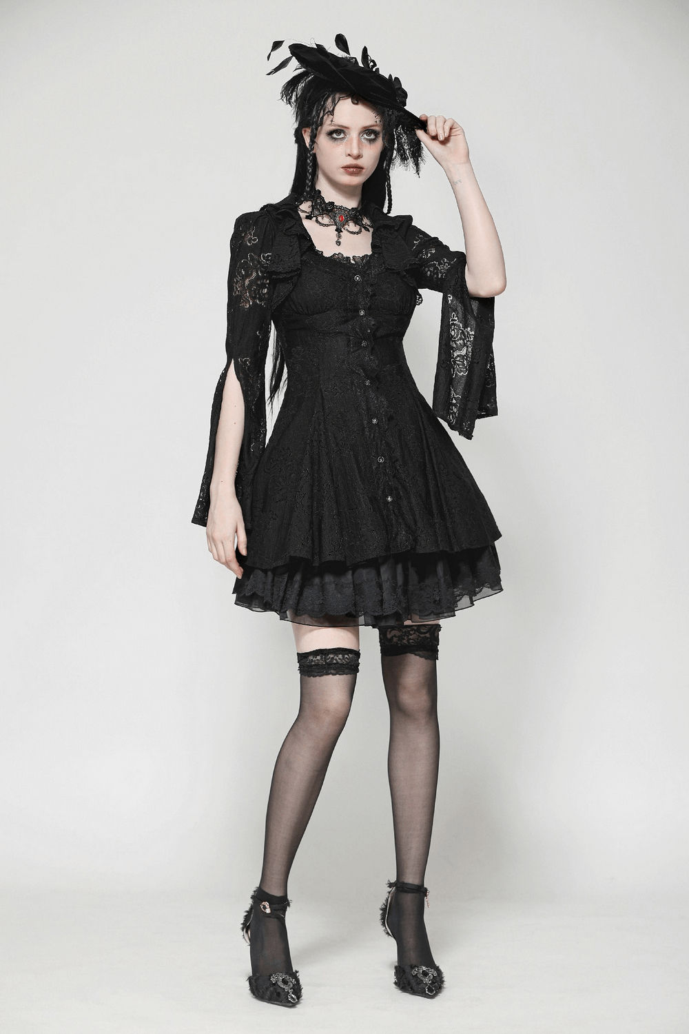 Victorian Gothic Lace Mini Dress with corset back, showcasing elegance in black lace and dramatic sleeves.
