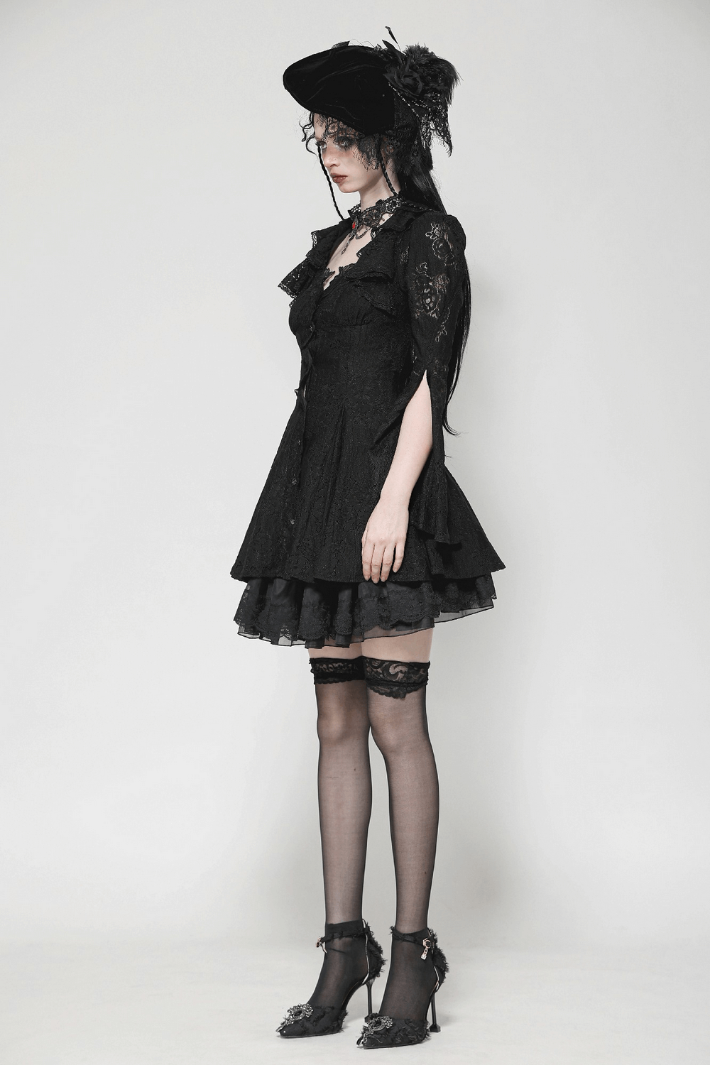 Elegant Victorian Gothic mini dress with lace details, corset back, and stylish accessories in black.