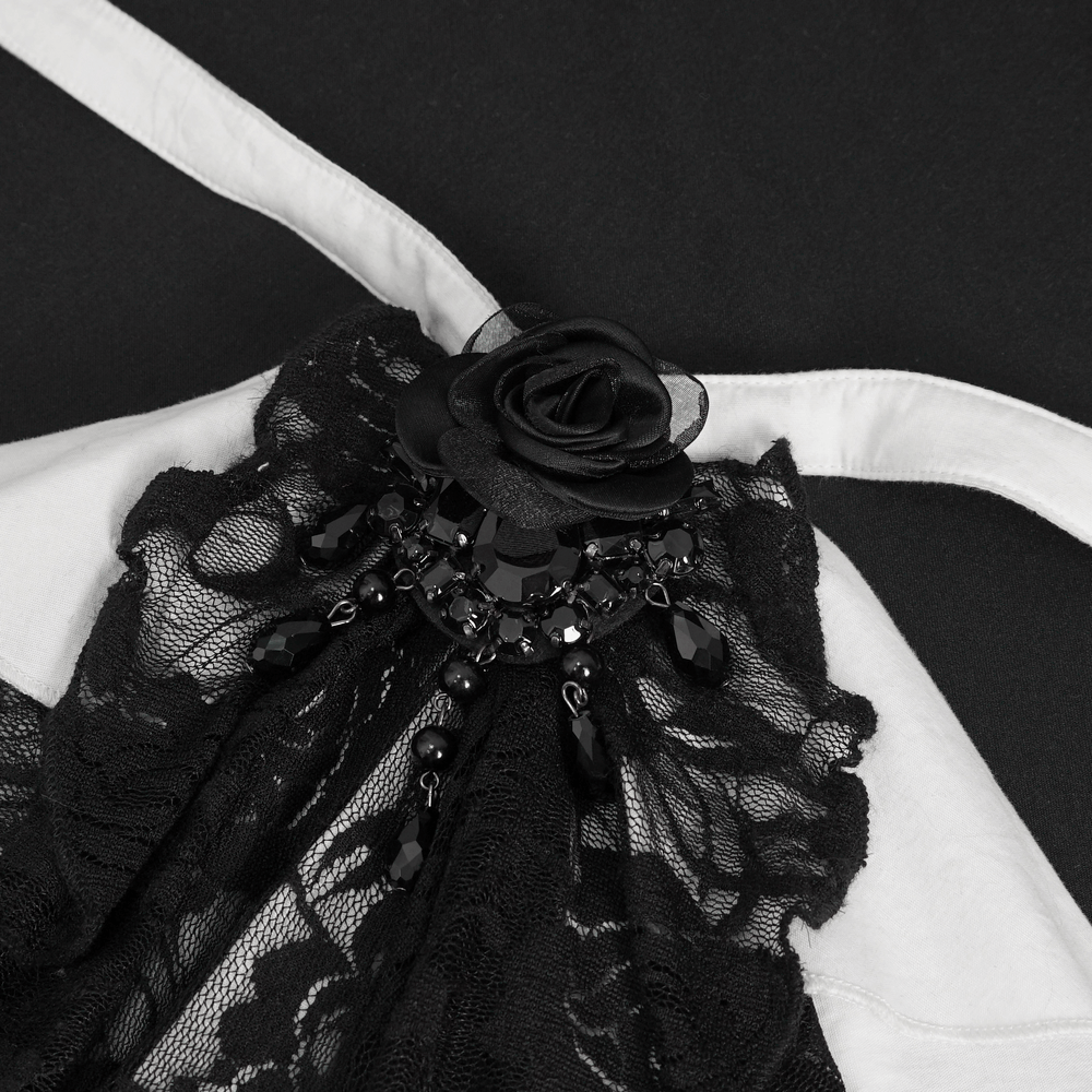 Close-up of Victorian Gothic lace ruffle blouse with detachable black rose tie and intricate lace detailing.