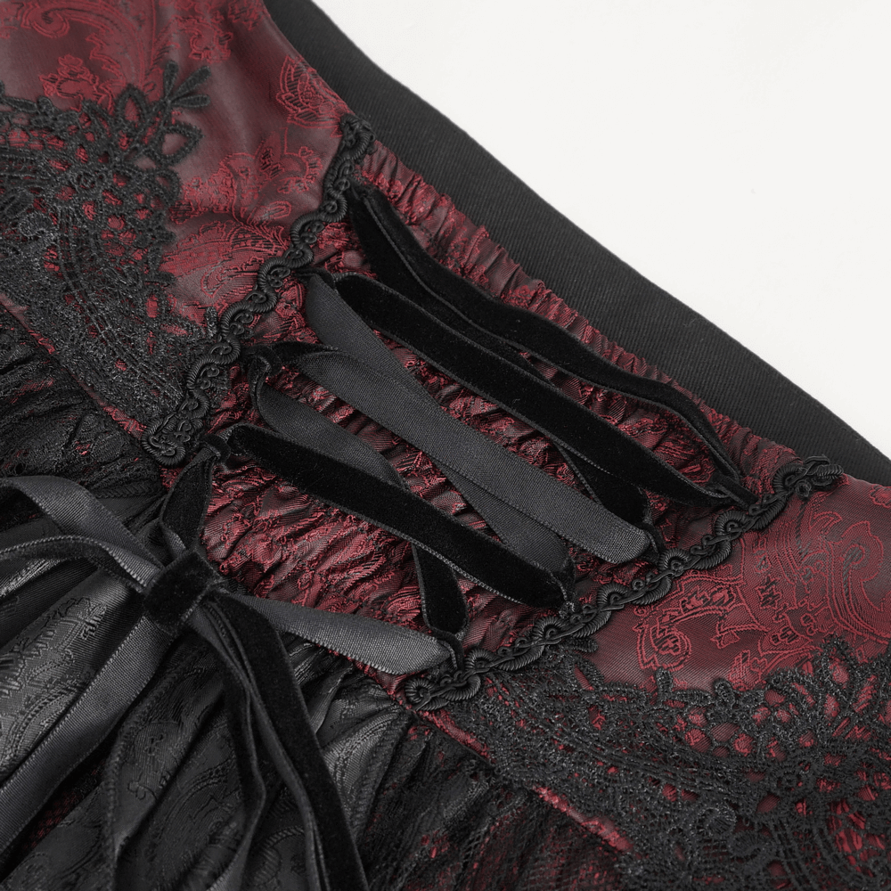 Elegant close-up of the Victorian Gothic lace skirt featuring ruffled layers and intricate velvet detailing.