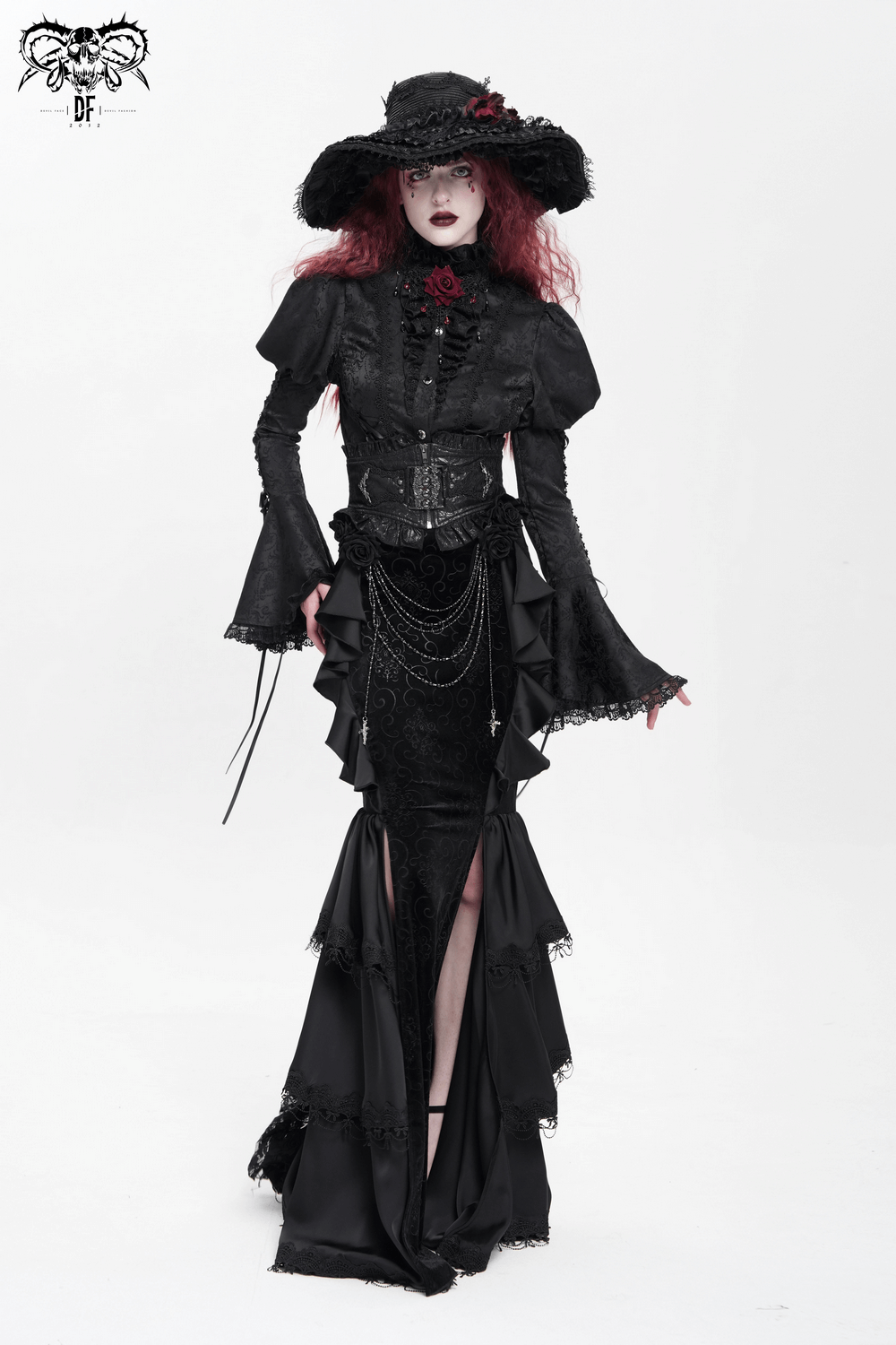 Victorian Gothic woman in black lace outfit with dramatic bell sleeves and hat, exuding elegance and edge.