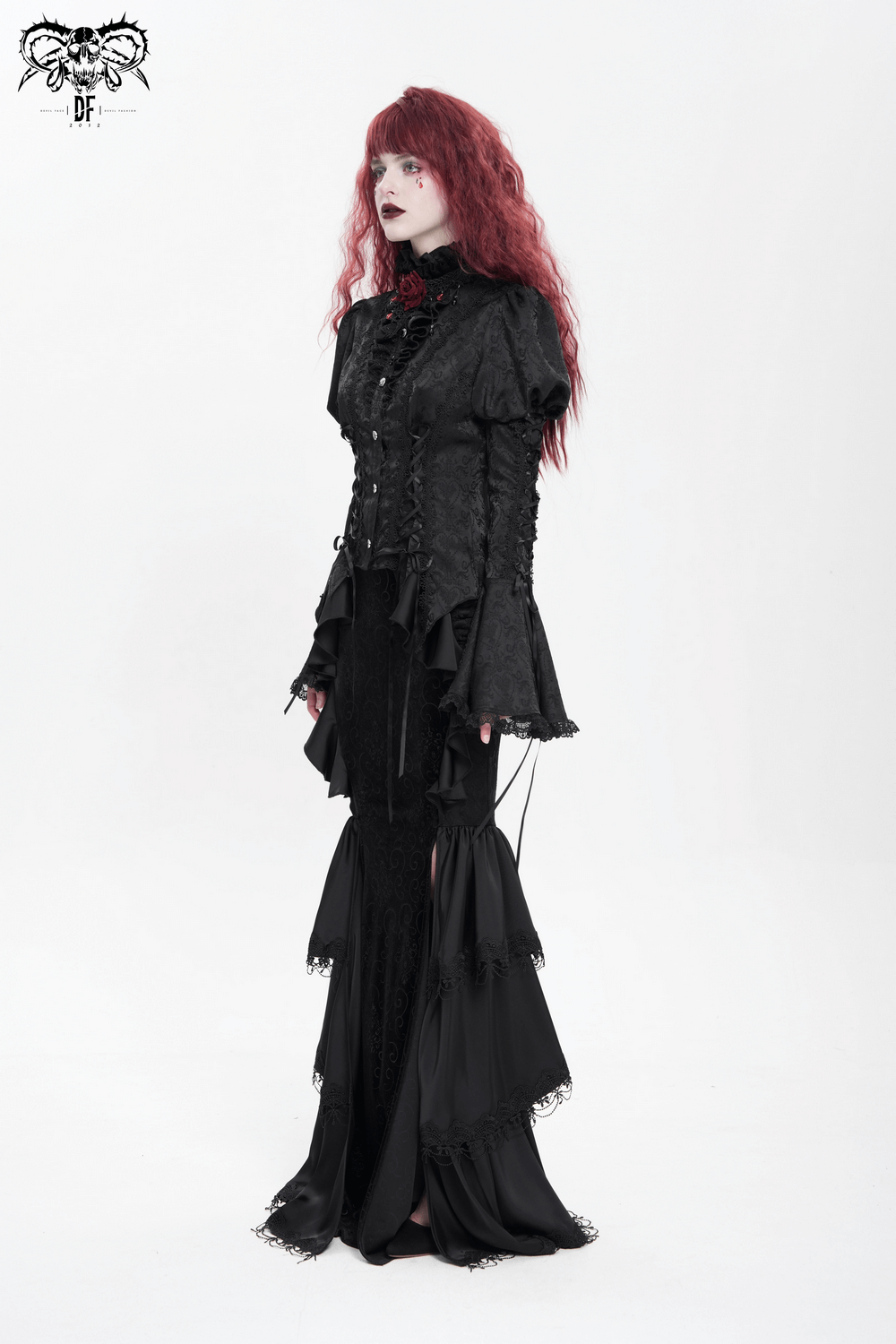 Victorian Gothic blouse with bell sleeves, lace-up front, and ruffled collar, perfect for alternative fashion.