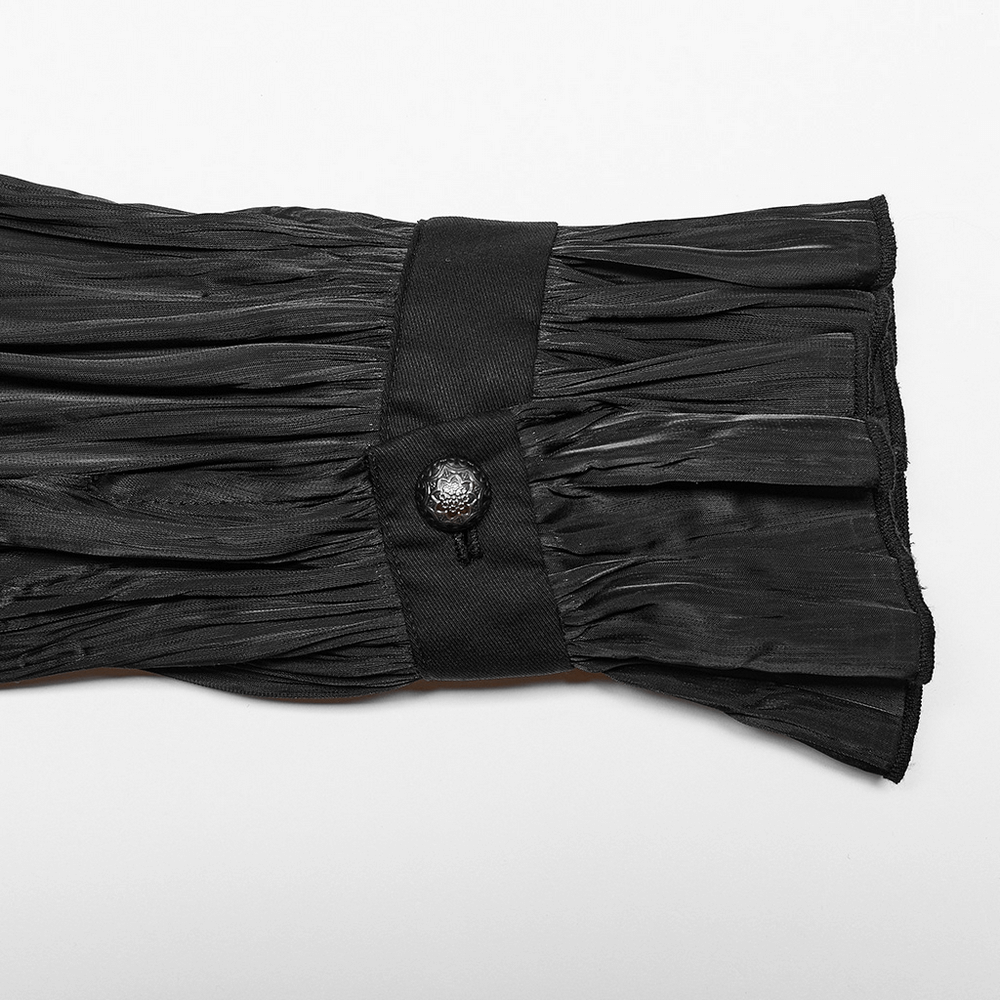 Close-up of Victorian Gothic Pleated Lace-Up Shirt showing intricate pleats and decorative button detail.