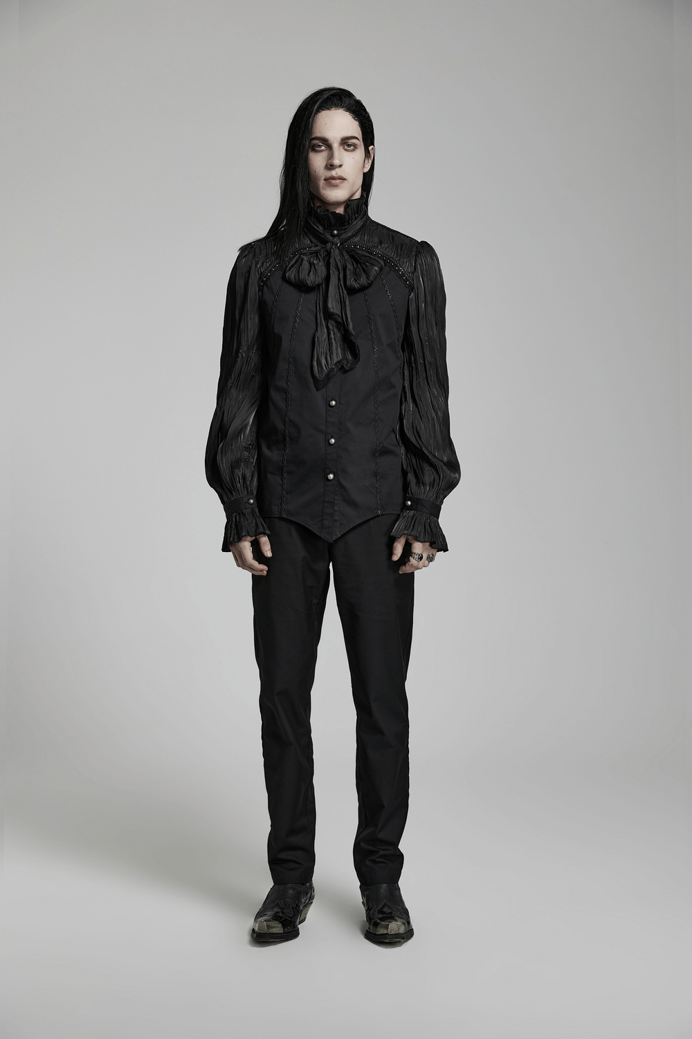 Victorian Gothic Pleated Lace-Up Shirt worn by model, showcasing dark elegance and intricate lace detailing.