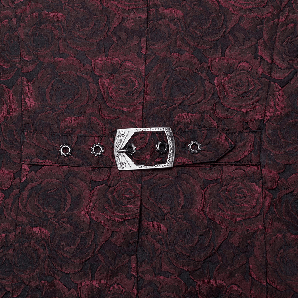 Close-up of rose-embroidered fabric with a decorative buckle on a Victorian Gothic waistcoat. Perfect for a dramatic look!