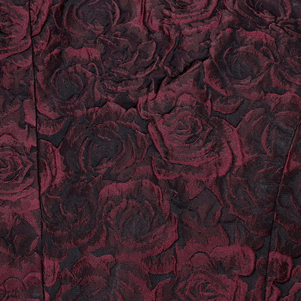 Close-up of rich burgundy fabric with intricate rose embroidery, perfect for a Gothic Victorian waistcoat design.