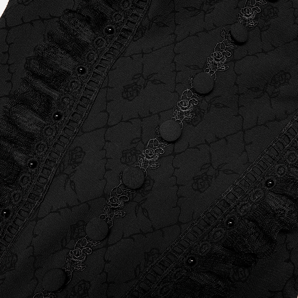 Close-up of the elegant black Gothic rose-pattern fabric with lace detailing and decorative buttons.