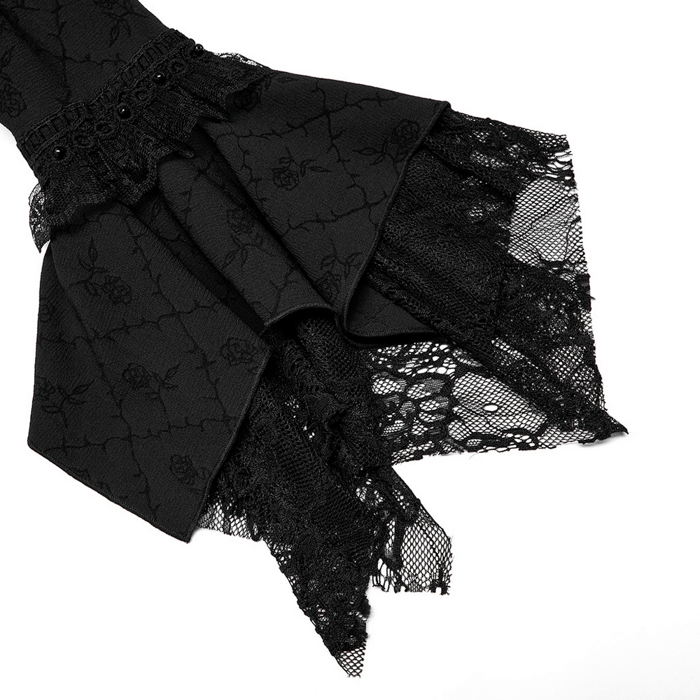 Elegant black lace detail of the Victorian Gothic Rose-Weave Gown showcasing delicate floral patterns.