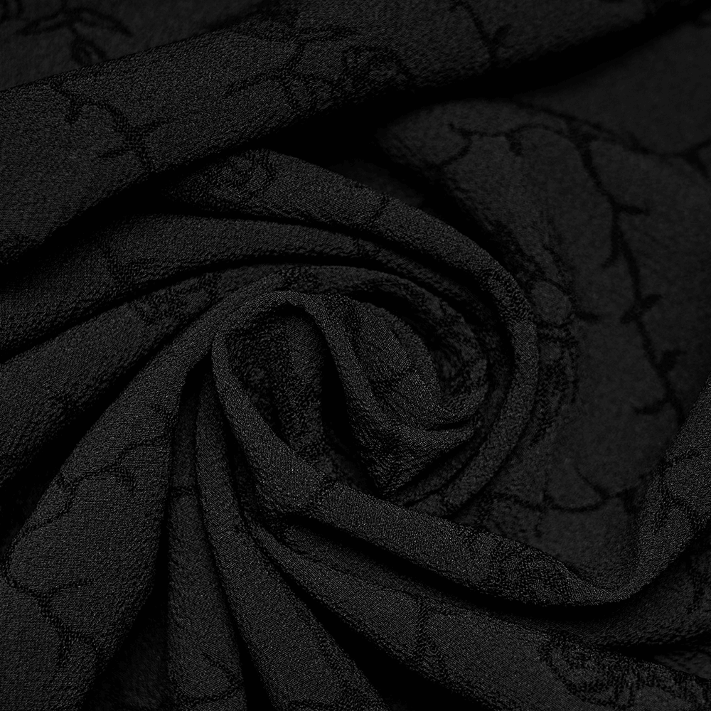 Close-up of elegant black rose-patterned fabric for the Victorian Gothic Rose-Weave Gown.