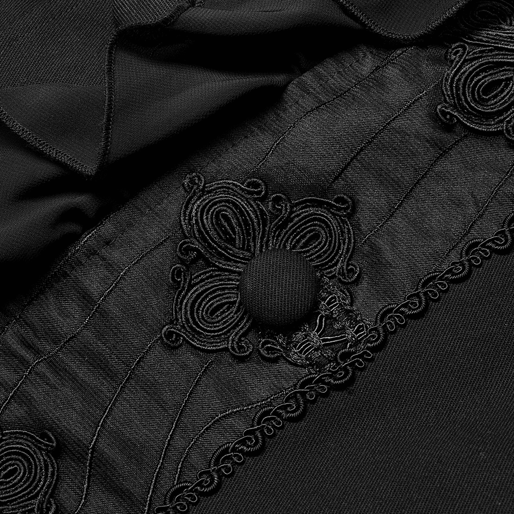 Close-up of Victorian Gothic Jacquard Vest featuring intricate black embroidery and elegant button detail.