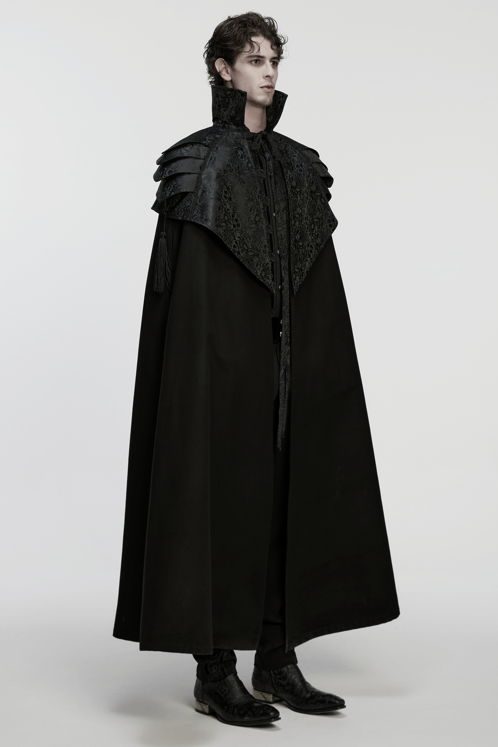 Victorian Gothic Shoulder Armor Cloak with Lace Detailing worn by a model, featuring intricate lacework and bold dark aesthetic.