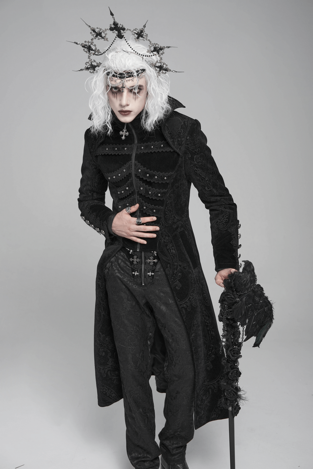 Victorian Gothic Tailcoat with Brocade and Metal Buttons worn by a model, featuring ornate details and dramatic styling.