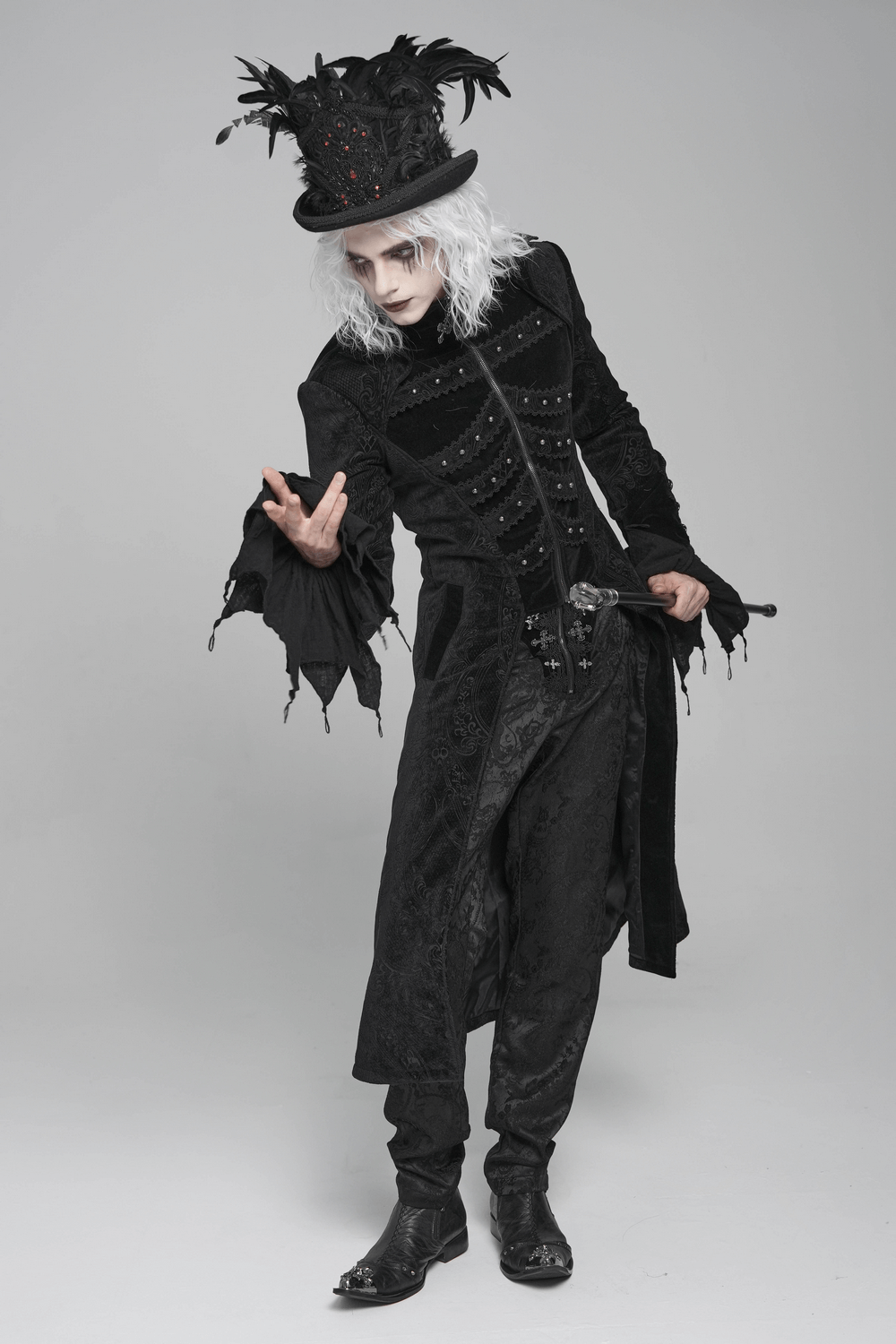 Victorian Gothic Tailcoat with Brocade and Metal Buttons worn by a dramatic performer in a theatrical pose.