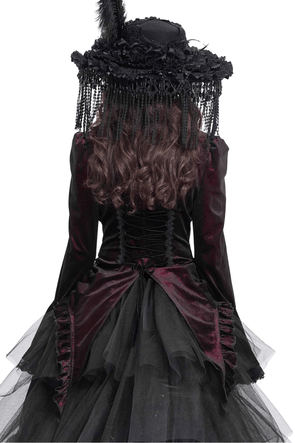 Back view of a Victorian gothic velvet blouse with lace details, bell sleeves, and corset-style lacing, paired with a dramatic hat.