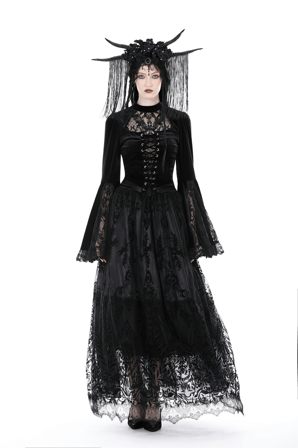 Victorian Gothic velvet lace top with bell sleeves, paired with a flowing black skirt for a dramatic look.