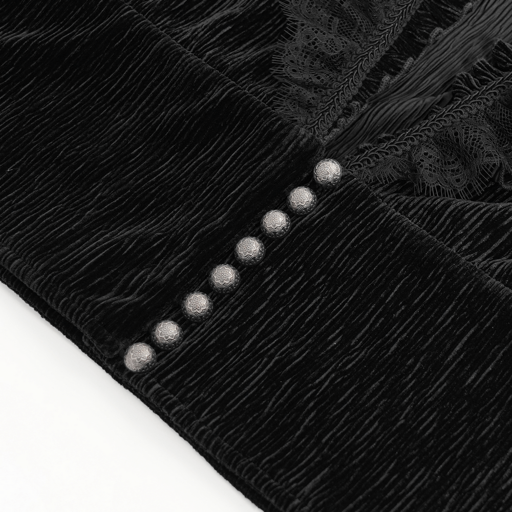 Close-up of Victorian Gothic velvet shirt showing intricate lace, ruffles, and elegant pearl buttons.