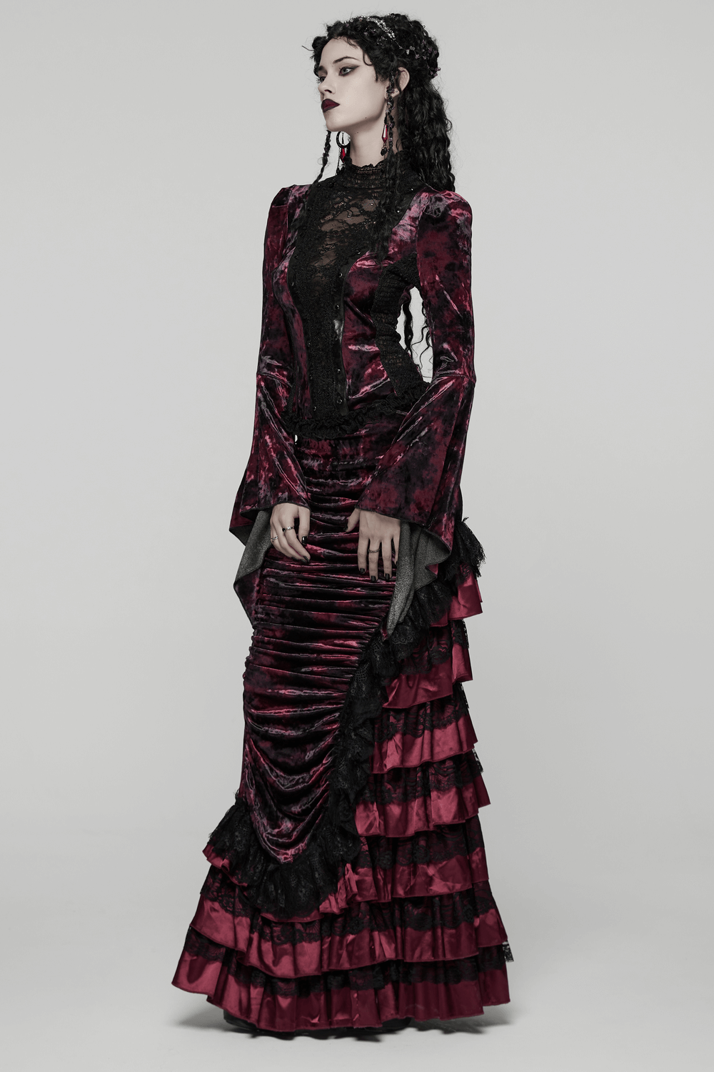 Victorian Gothic Velvet Skirt with Ruffled Lace Hem worn by a model showcasing its elegant design and dramatic flair.