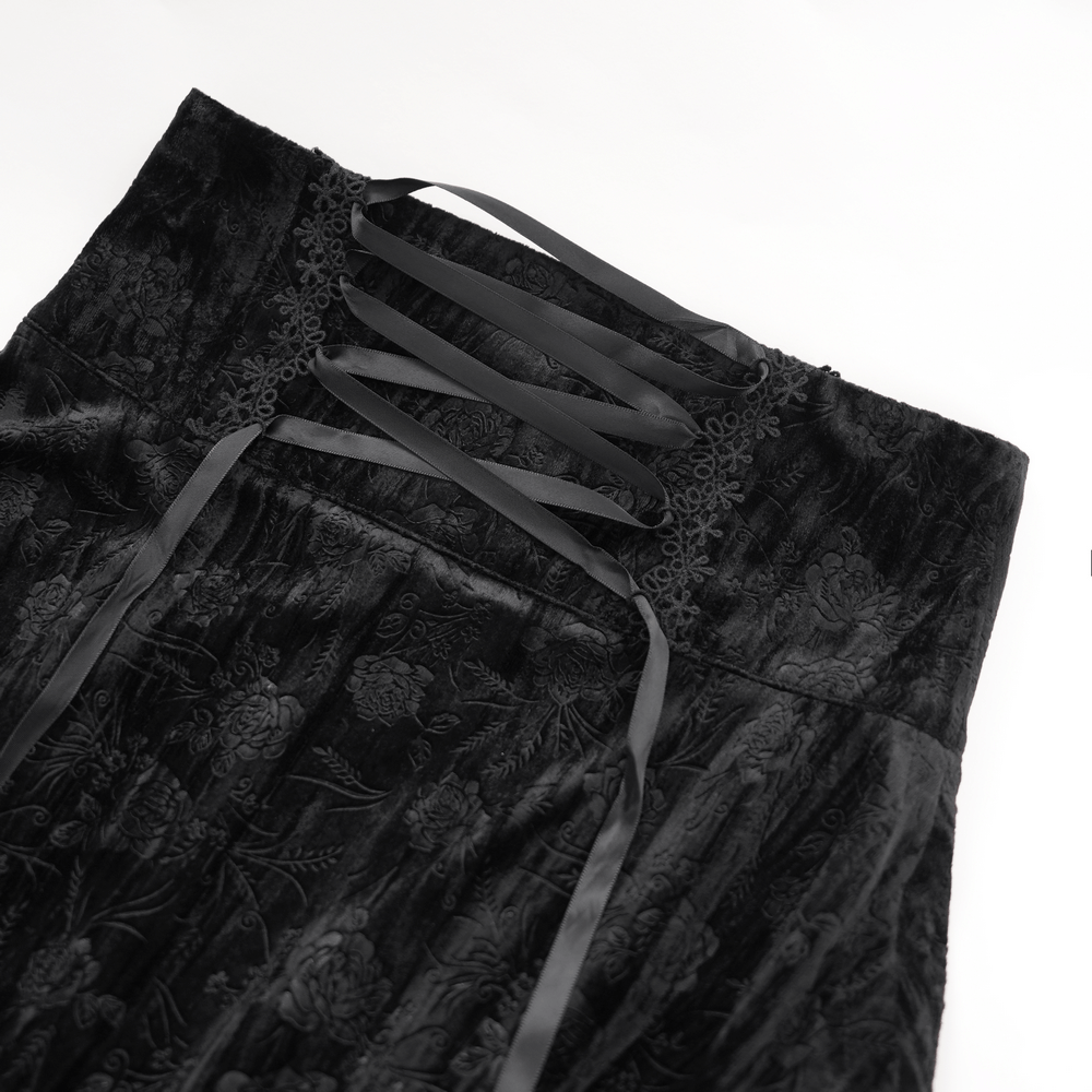 Victorian high-waist skirt with intricate lace detailing and black ribbons, showcasing elegant gothic style.