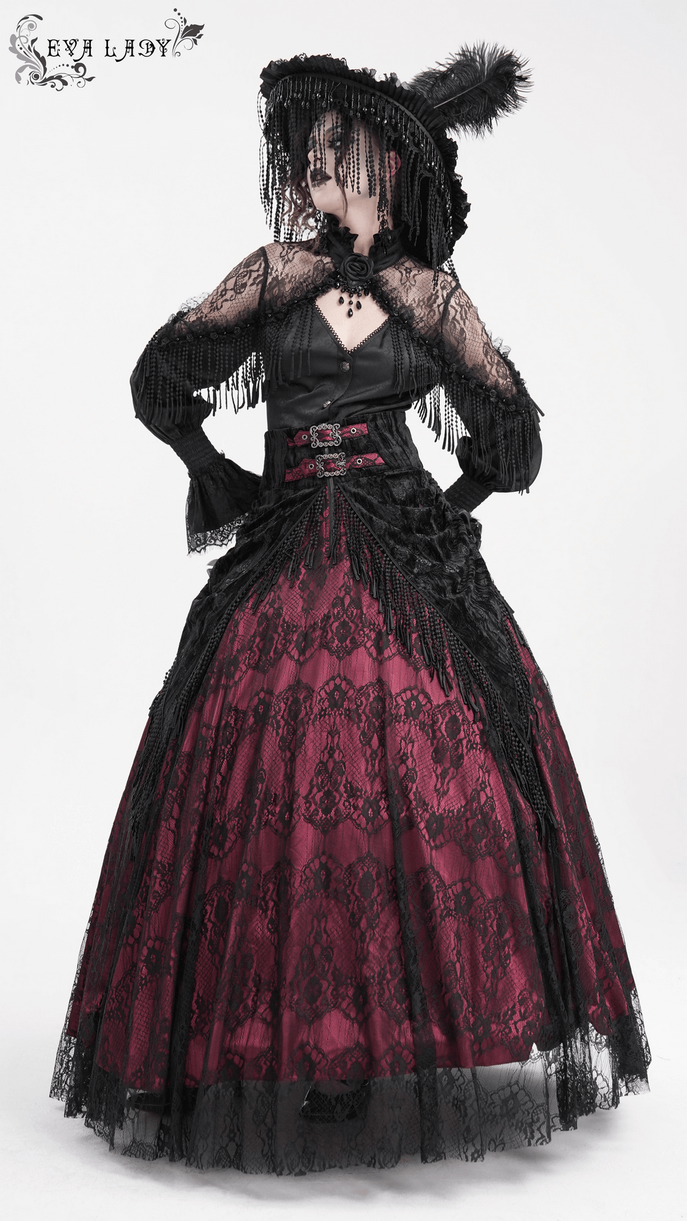 Victorian high-waist skirt in black lace with deep magenta lining, featuring tassels and floral accents for gothic elegance.