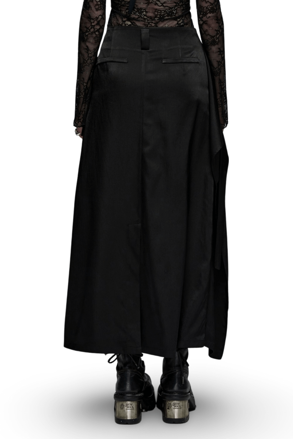 Back view of a Victorian-inspired black A-line maxi skirt with pockets, worn with edgy combat boots.