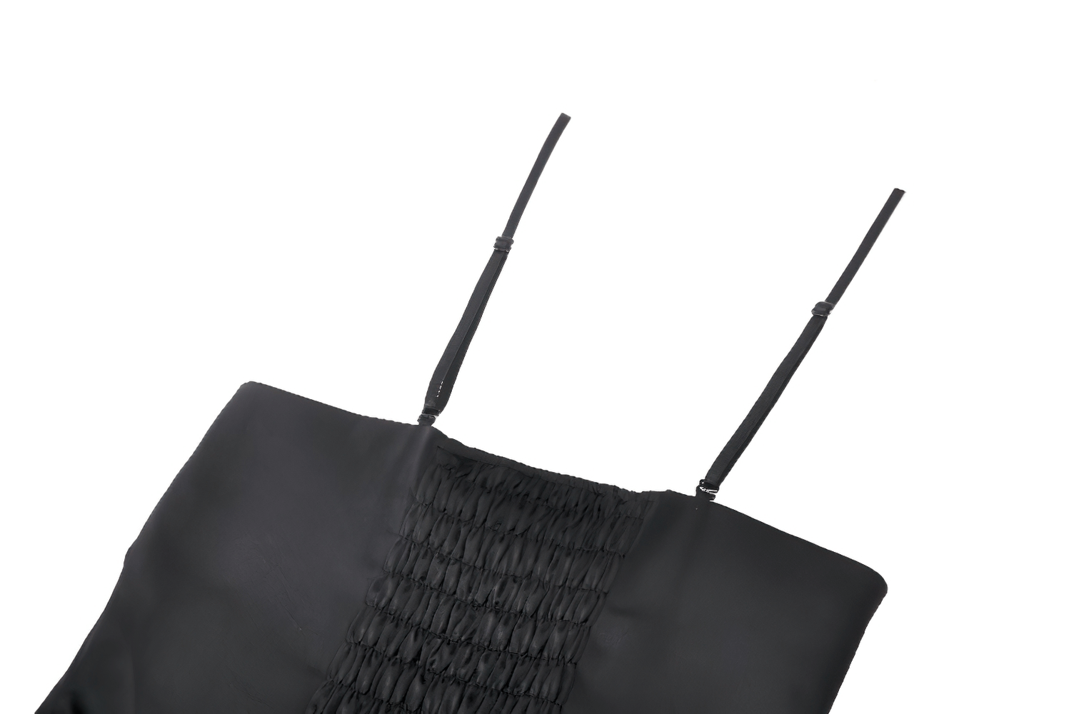 Close-up of a black dress top with smocked detailing and thin straps, showcasing gothic elegance.