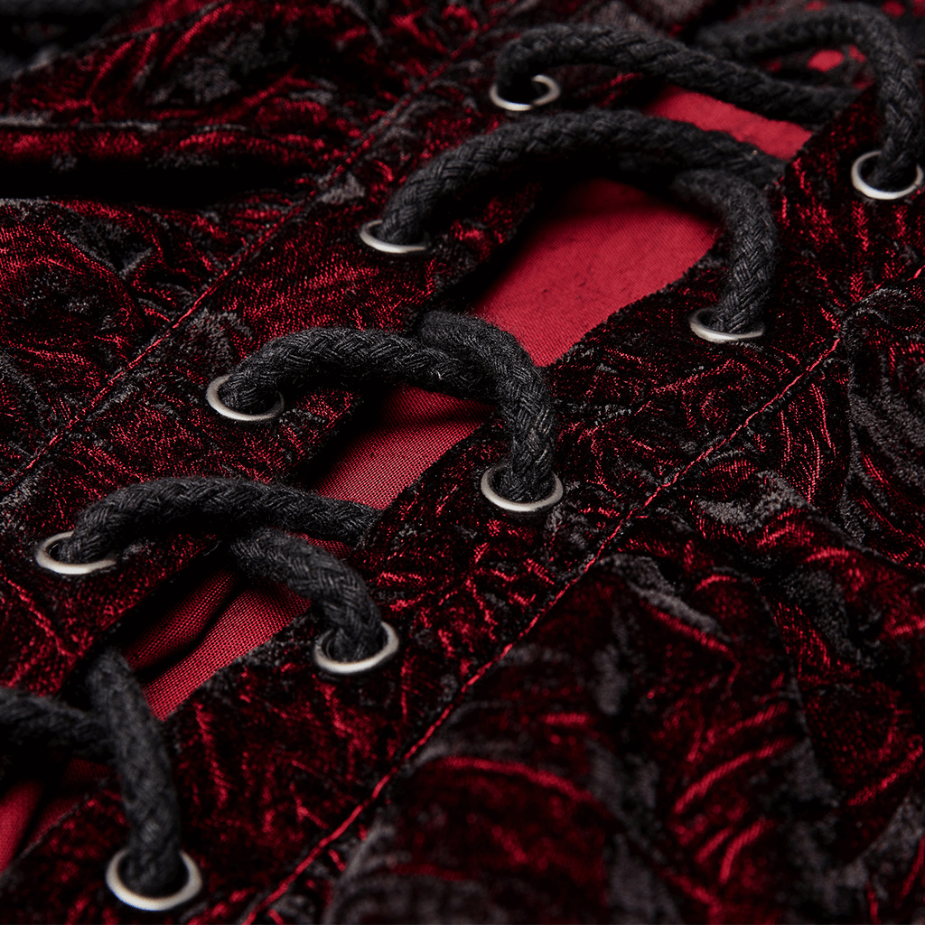 Close-up of the crimped velvet fabric and intricate lace-up detail of a Gothic Victorian shirt for men.