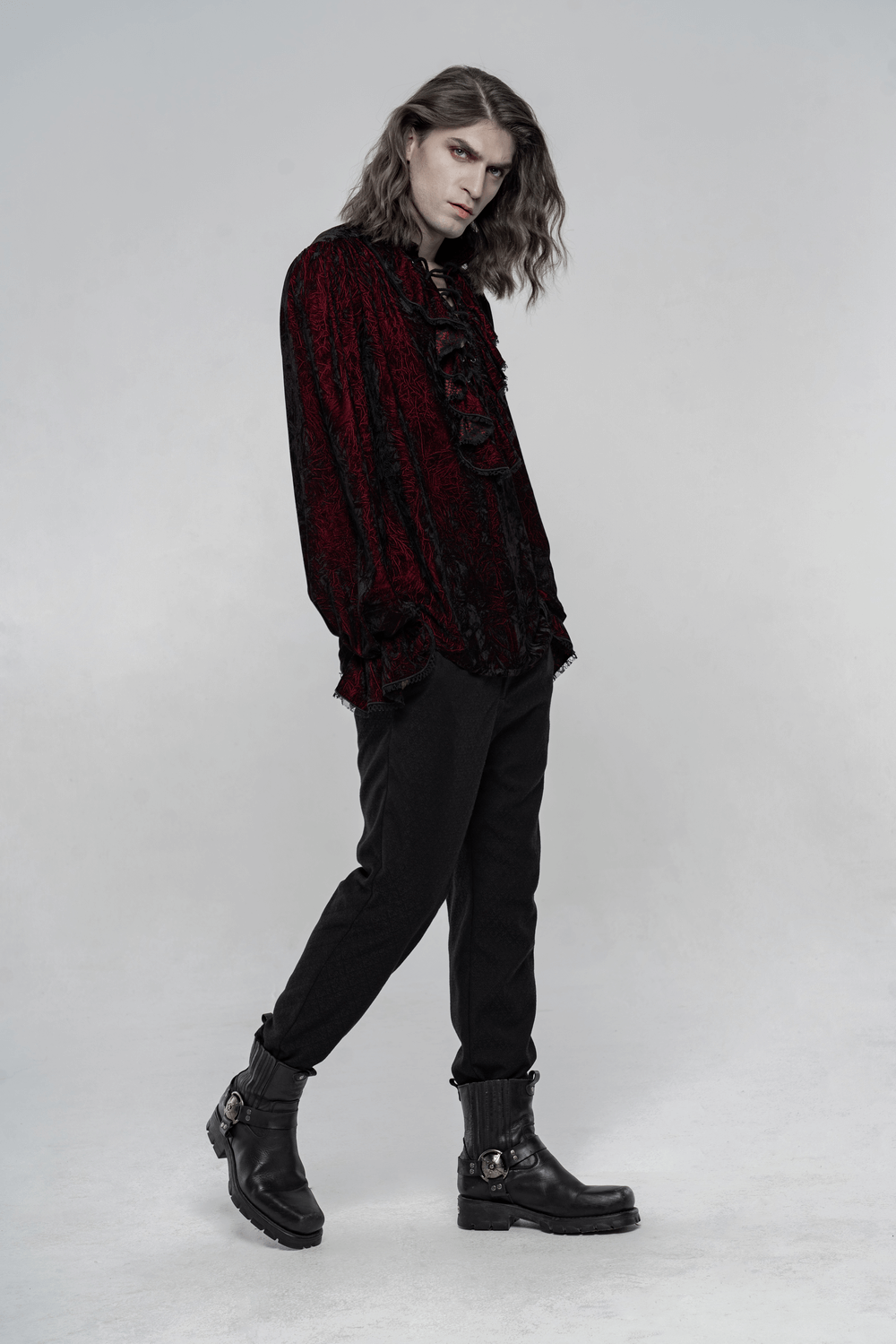Victorian Inspired Crimped Velvet Gothic Shirt for Men in deep red, paired with stylish black pants and boots.