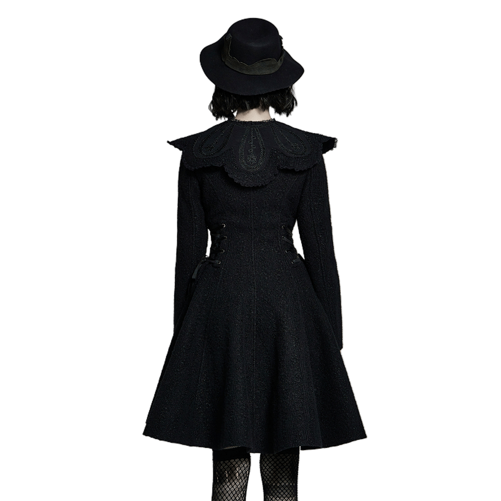 Back view of a Victorian-inspired black woollen coat with a wide collar and fitted bodice, paired with a stylish hat.