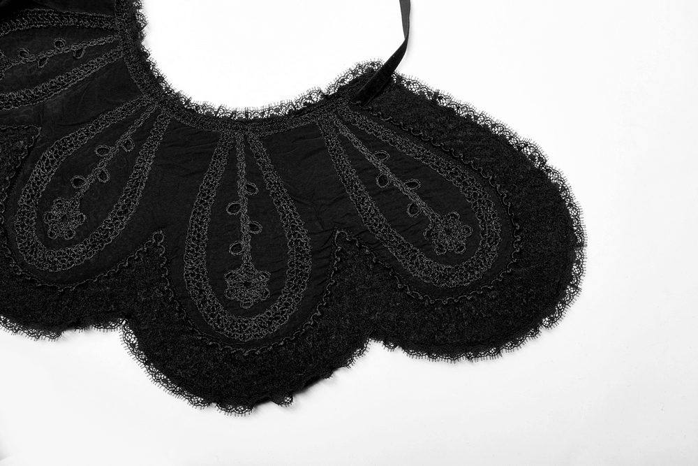 Victorian-inspired black lace collar with intricate embroidery and scalloped edges for gothic elegance.