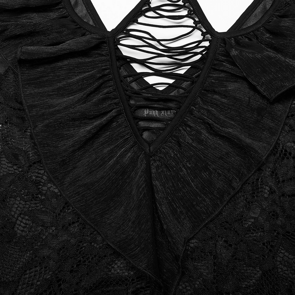 Close-up of the elegant lace and ruffled neckline of a Victorian-inspired goth dress, showcasing its intricate details.