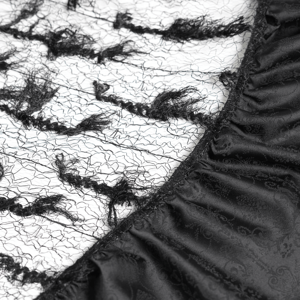 Detail view of Victorian-Inspired Gothic Ruffle Skirt with Cross Details showcasing black ruffles and intricate lace.