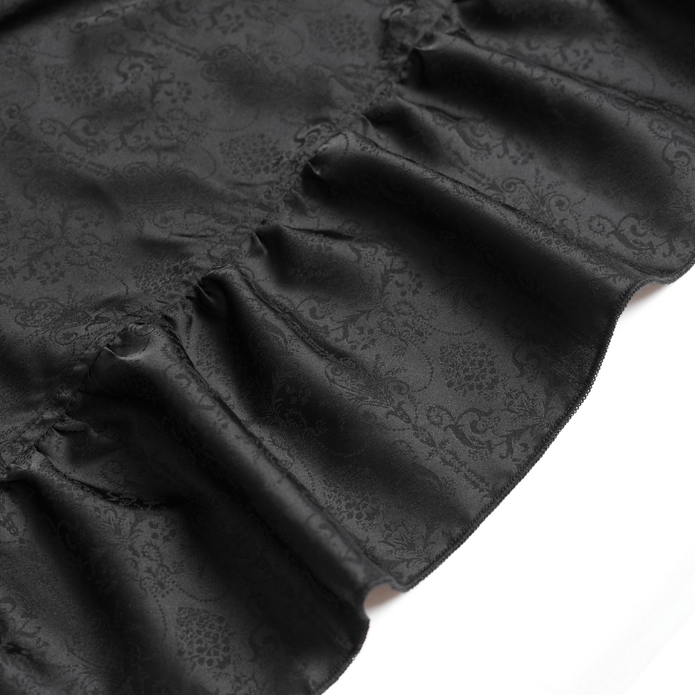 Victorian-Inspired Gothic Ruffle Skirt with Cross Details close-up of layered satin ruffles in black.