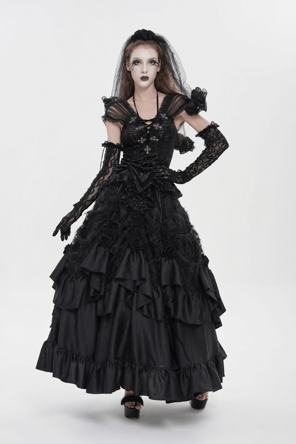 Victorian-Inspired Gothic Ruffle Skirt with Cross Details worn by a model in a dramatic black gown.