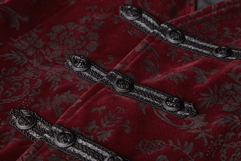 Close-up of a Victorian-inspired Gothic waistcoat with rich burgundy velveteen and intricate black button details.