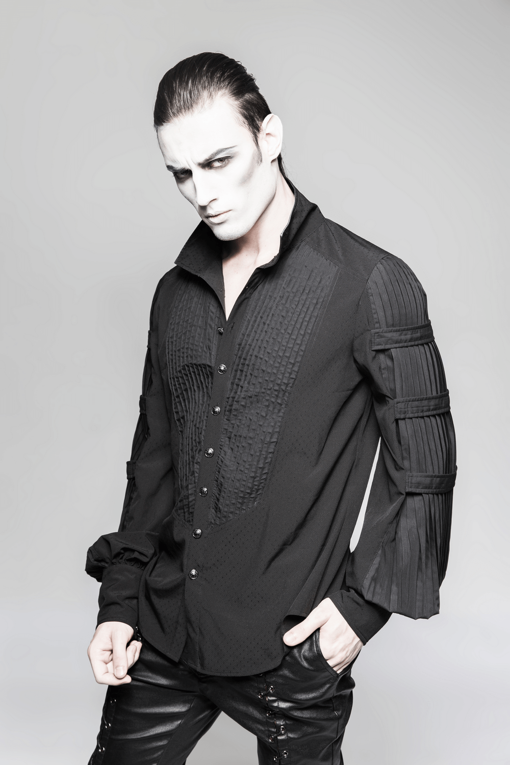 Victorian-inspired black Jacquard steampunk shirt with pleated sleeves, styled for a trendy gentleman look.