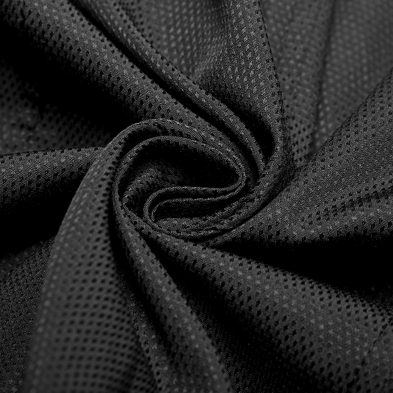 Close-up of soft black mesh fabric, showcasing its breathable texture and intricate weave pattern.