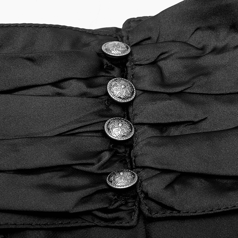 Elegant black fabric featuring decorative buttons and pleated design, perfect for a Victorian-inspired outfit.