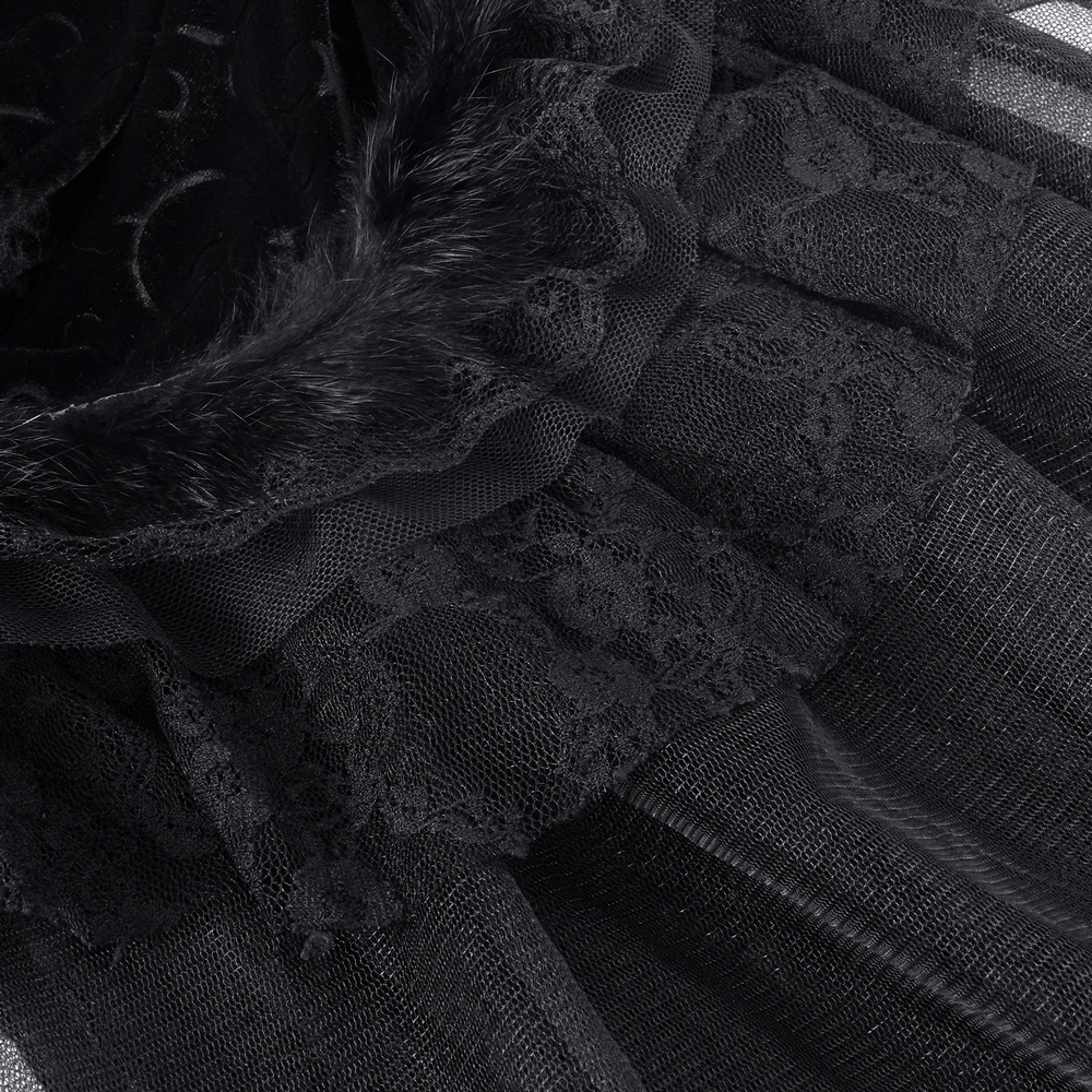 Close-up of black velvet, lace, and tulle layers in elegant Victorian-inspired leg warmers.